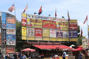 Crowd gathered at Brantford Ribfest in Ontario with food vendors and signage