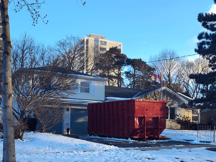 Orange 40 Yard Bin parked in driveway