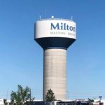 Milton water tower marked with Halton Region on a clear day
